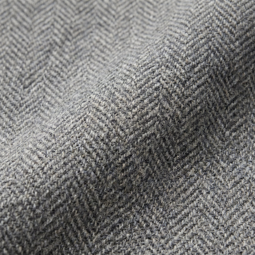 Tavi wool trousers herringbone fabric close-up