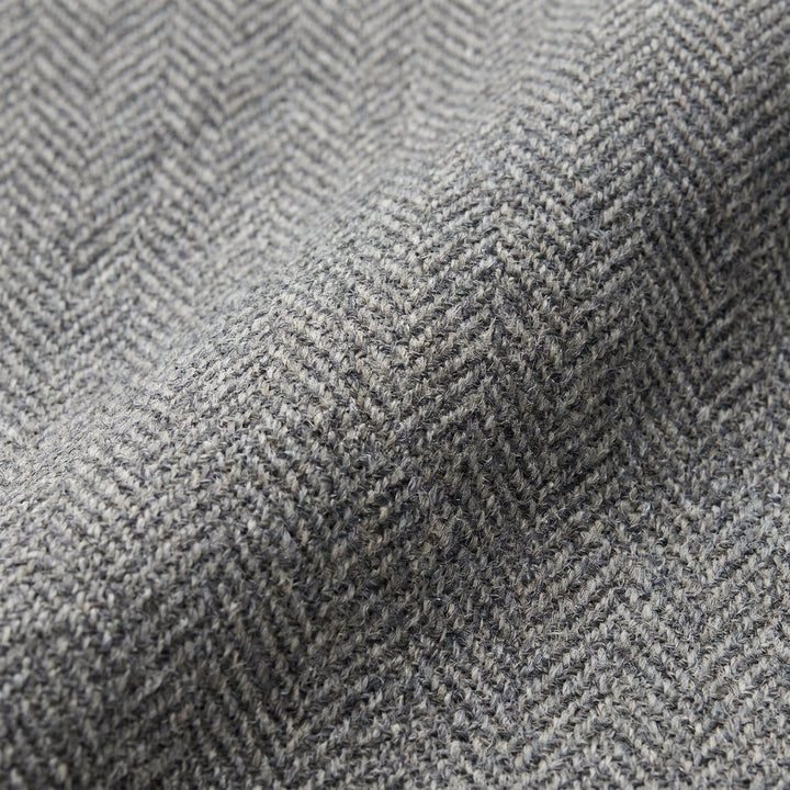 Tavi wool trousers herringbone fabric close-up