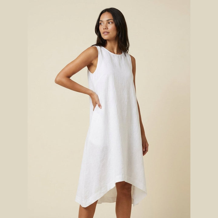 Tessa white linen dress on model side pose
