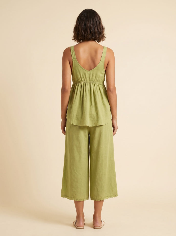 Vera light green linen set back on model