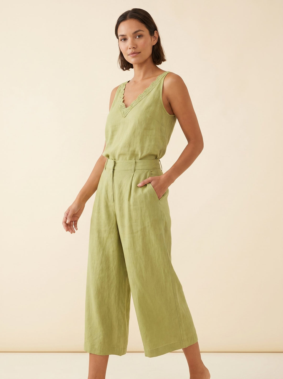 Vera light green linen set three quarter pose on model