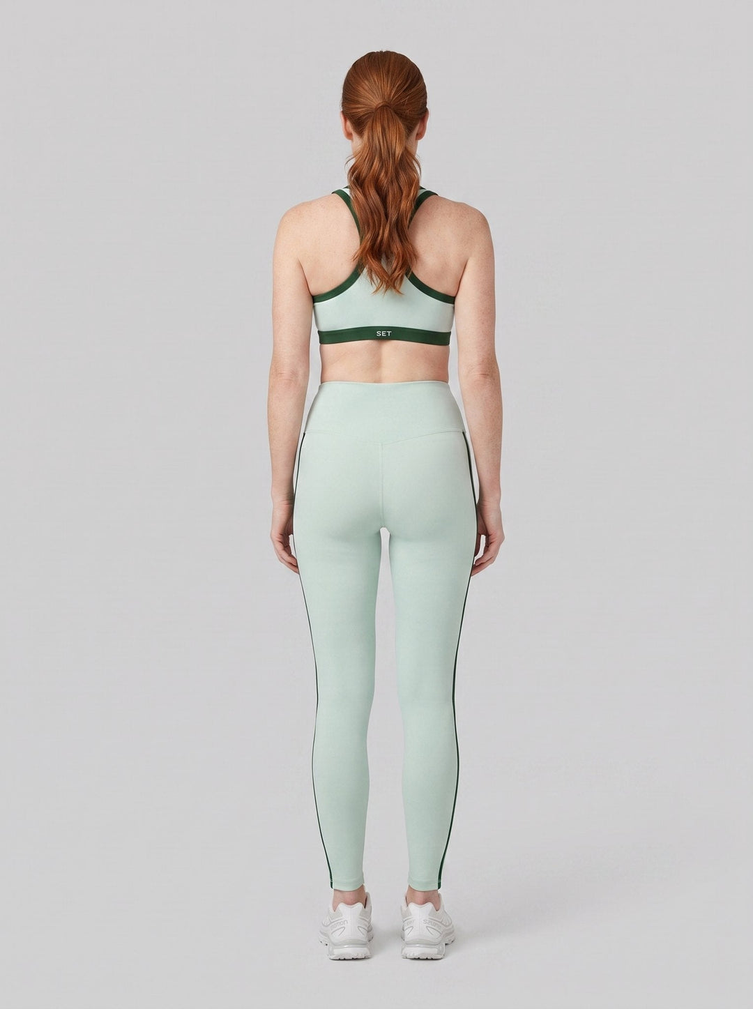 Striped high-rise leggings in Ibiza, back view on model