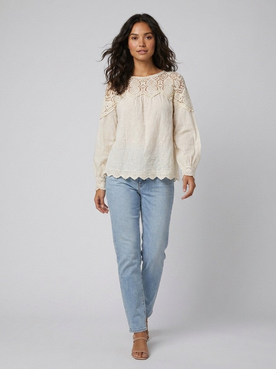 Zara cream broderie blouse walking pose